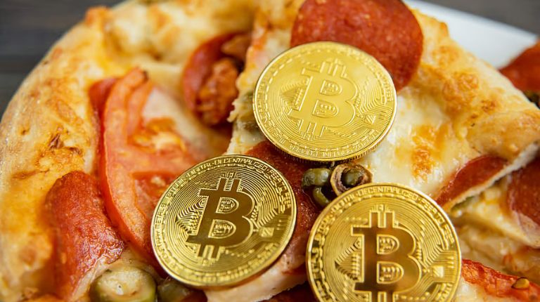 Bitcoin quebra recordes no "Pizza Day" com rali impulsionado por instituições 1 Copia de Contra Capa 72 1
